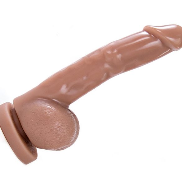 Jollies Mr. Man blowjob dildo, with a hole through the shaft for transferring suction to the wearer.