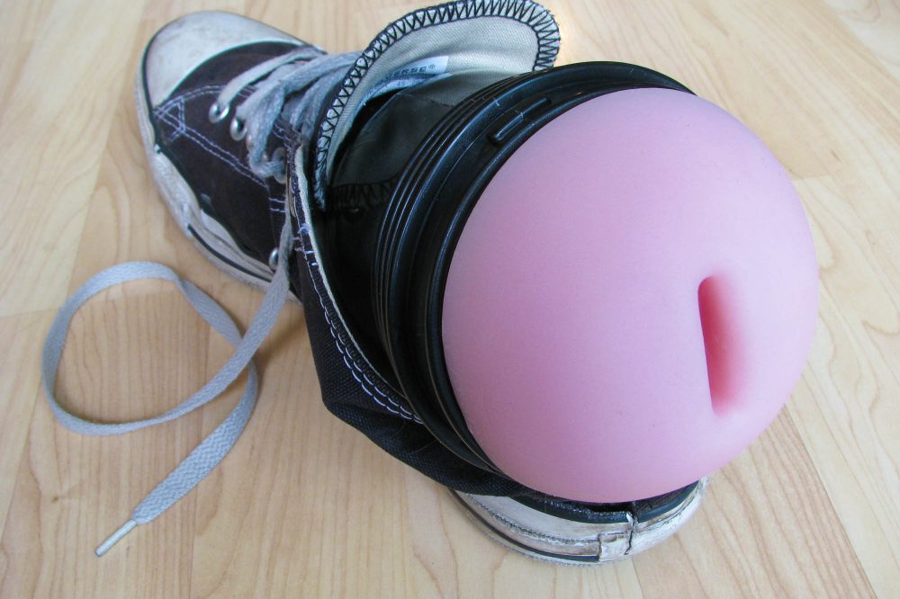 The shoe method of using a Fleshlight, tucked into the end.