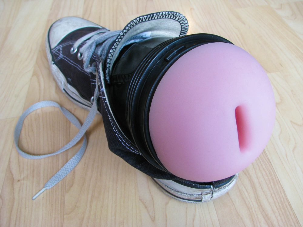 The shoe method of using a Fleshlight, tucked into the end.