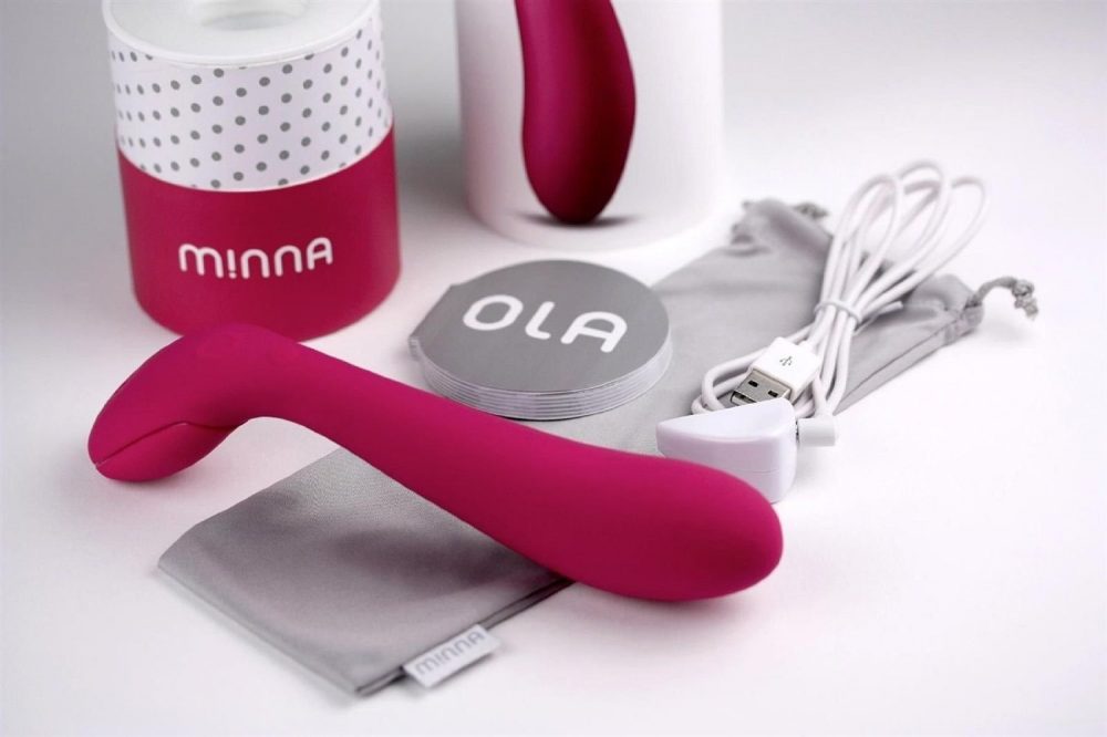 Minna Ola, a smooth slightly curved vibrator with a squeezable handle.