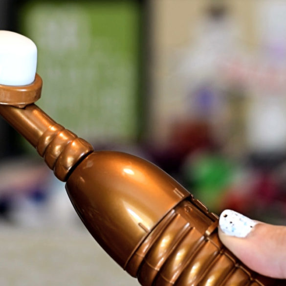 Me holding the mighty Eroscillator, with the pillowy marshmallow attachment.