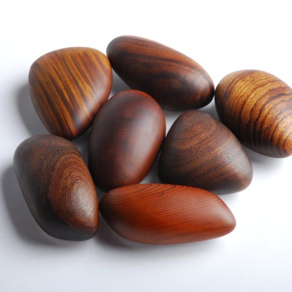 A bunch of pebble-shaped wooden objects.
