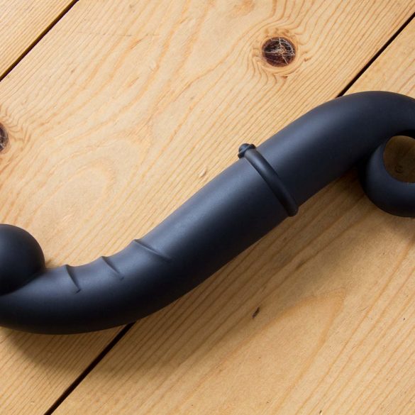 Ophoria Beyond 3 dildo on a wooden floor.