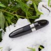 LELO Mia rechargeable bullet vibrator, in some snow.