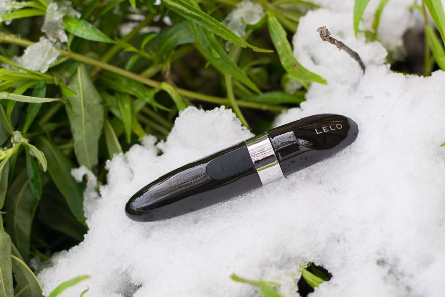 LELO Mia rechargeable bullet vibrator, in some snow.