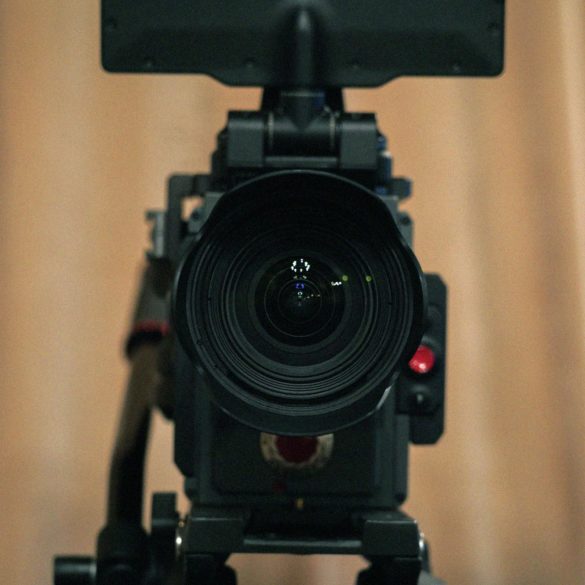 Video camera pointed directly at you, ominously.