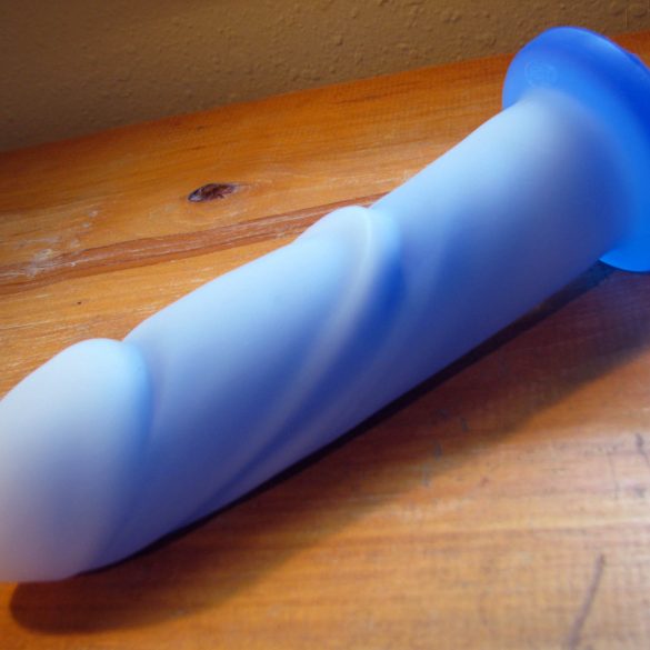 Tantus Cush O2 on a wooden table.