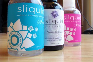 Bottles of Sliquid lined up: Sliquid Sea, Organics Gel, and Sassy.