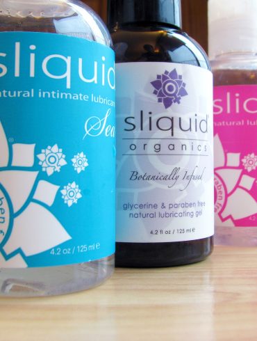 Bottles of Sliquid lined up: Sliquid Sea, Organics Gel, and Sassy.