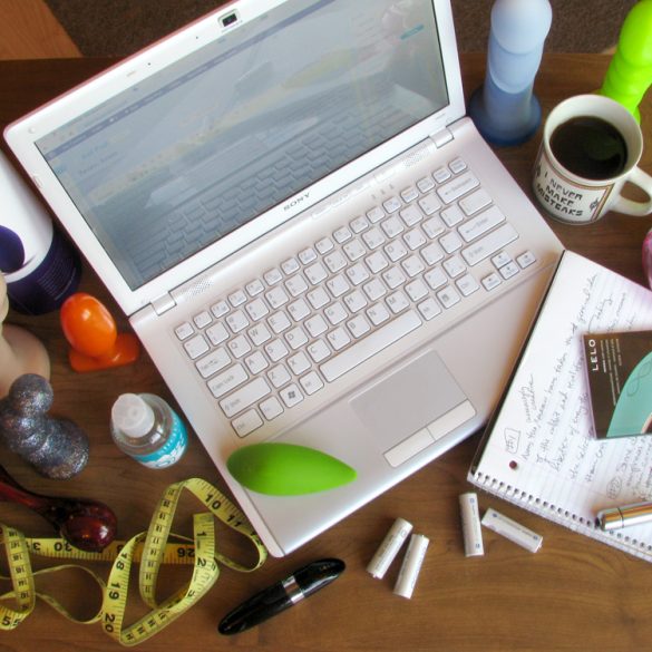Welcome to my life. Sex toys all around, a laptop, measuring tape, coffee, batteries...