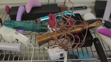 Pile of vibrators from Revel Body promo video.