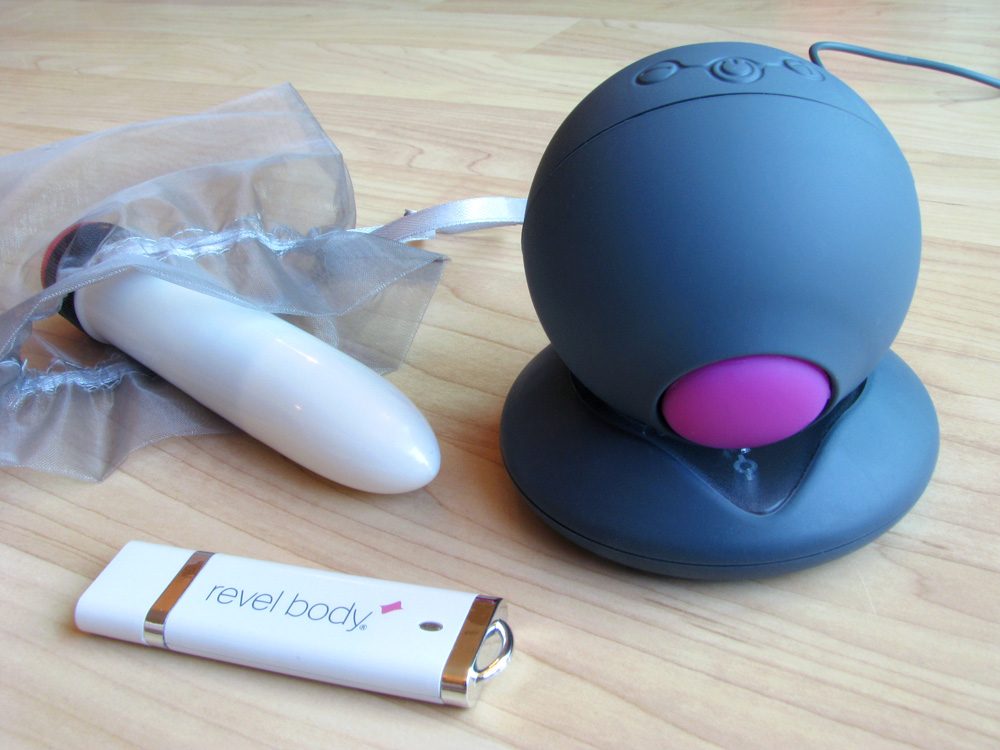 Revel Body sonic vibrator... plus jump drive and "competitor model."