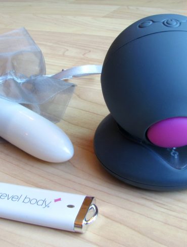 Revel Body sonic vibrator... plus jump drive and "competitor model."