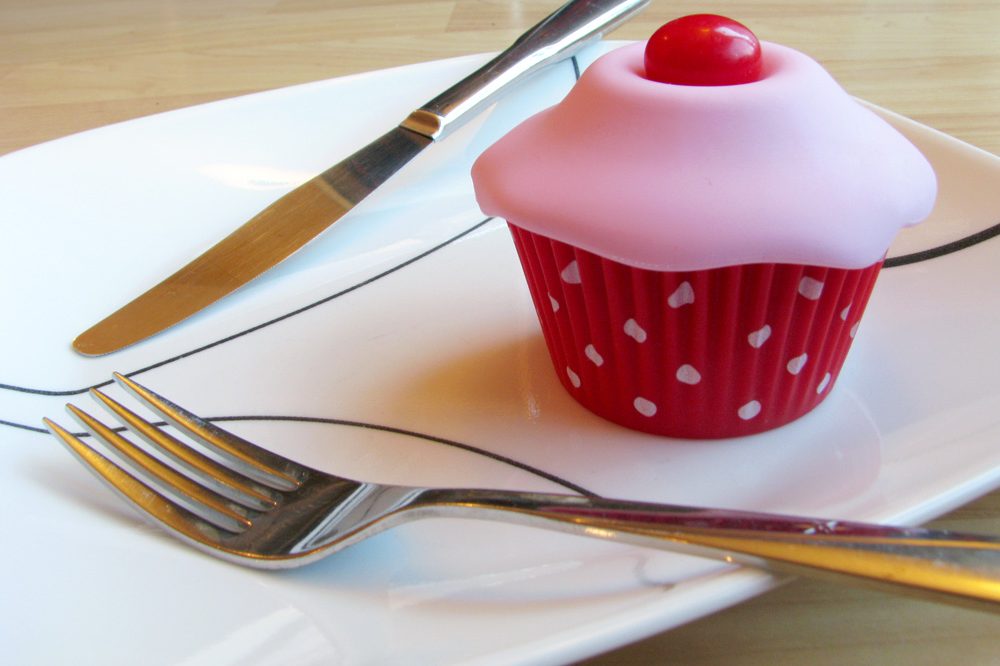 Shiri Zinn Cupcake vibrator, and the tools to dismantle the patriarchy. (Fork and knife.)