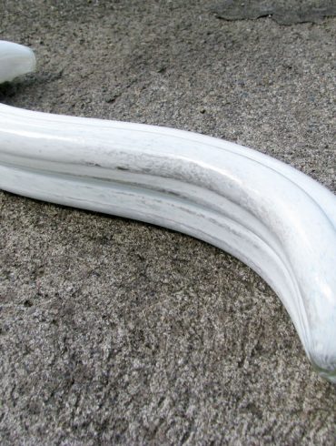 Fucking Sculptures G-Spoon large glass dildo on rough cement.