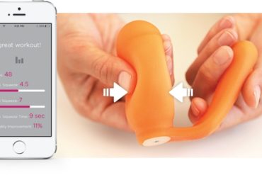kGoal kegel trainer exerciser sex toy being squeezed, next to its corresponding phone app.