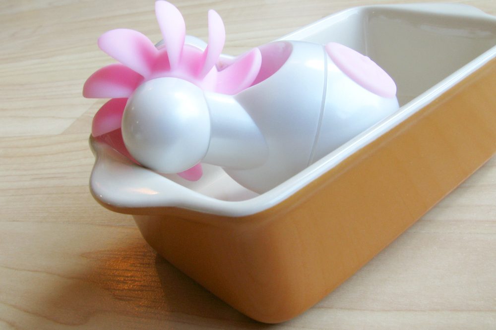 Lovehoney Sqweel Go oral sex toy in a tiny casserole dish