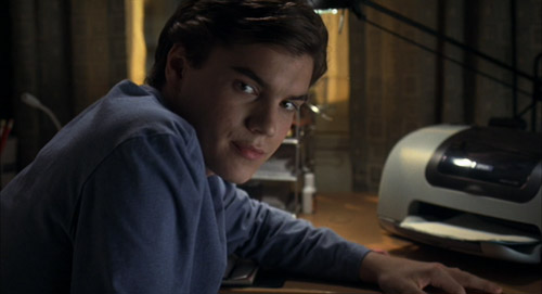 Matthew (Emile Hirsch) furtively masturbating under his desk in The Girl Next Door.