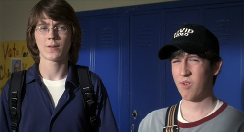 Klitzy (Paul Dano) and Eli (Chris Marquette) in The Girl Next Door. Note the Vivid Video hat.