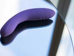 We-Vibe Rave rechargeable G-spot vibrator with its phone app.