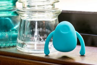 Dame Products Eva "hands-free" "couples" wearable vibrator standing up like a creepy bug.
