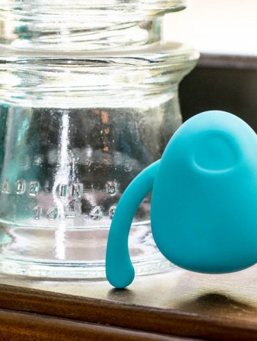 Dame Products Eva "hands-free" "couples" wearable vibrator standing up like a creepy bug.