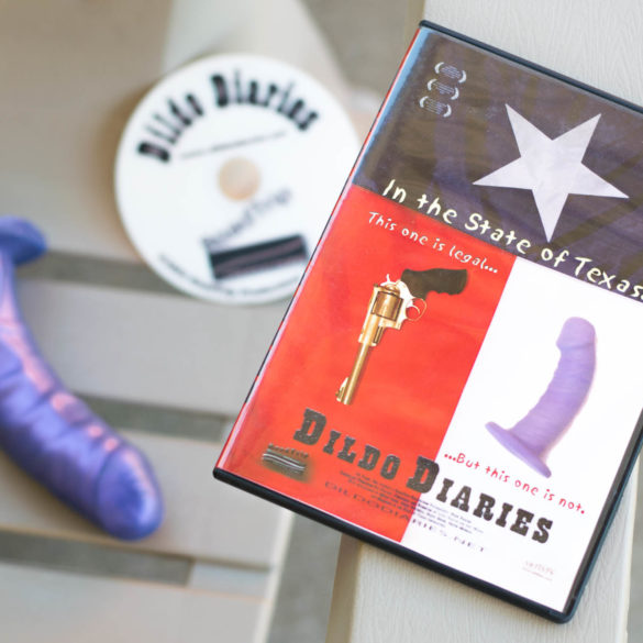 Dildo Diaries (2002). DVD sitting next to a purple dildo.