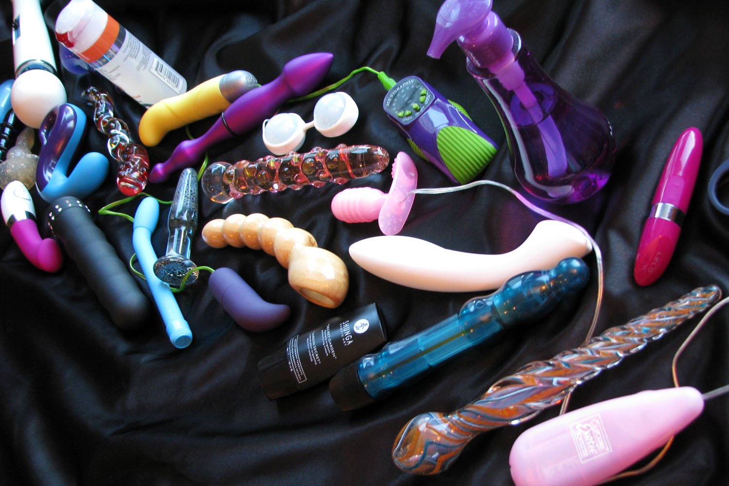 Outtake from my header image photoshoot. Sex toys all over my Throw.