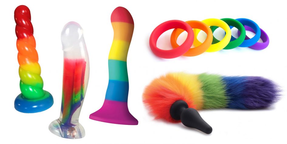 Rainbow dildos from Split Peaches, Funkit Toys, and NS Novelties, plus rainbow cock rings and a butt plug with rainbow tail.