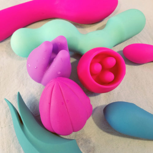 A gaggle of sex toys, with the Jimmyjane Love Pods in the center.