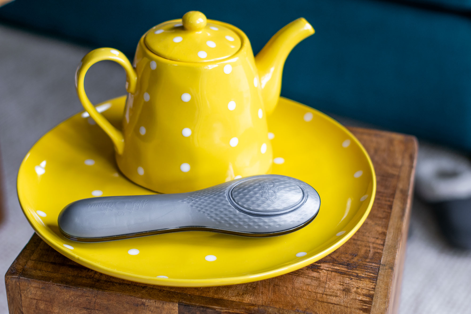 Hot Octopuss Queen Bee oscillating rechargeable vibrator with a yellow polka dot tea set.