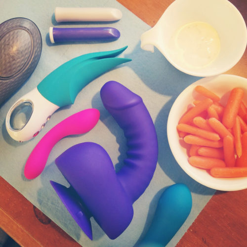Mid-masturbation snacks (carrots and ranch) and sex toys including the Lovehoney Uprize.
