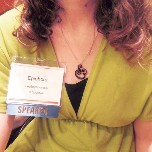 Me wearing a conference badge