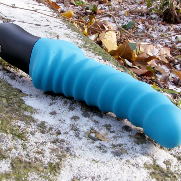 Fun Factory Stronic Drei pulsator outside, on icy cement.
