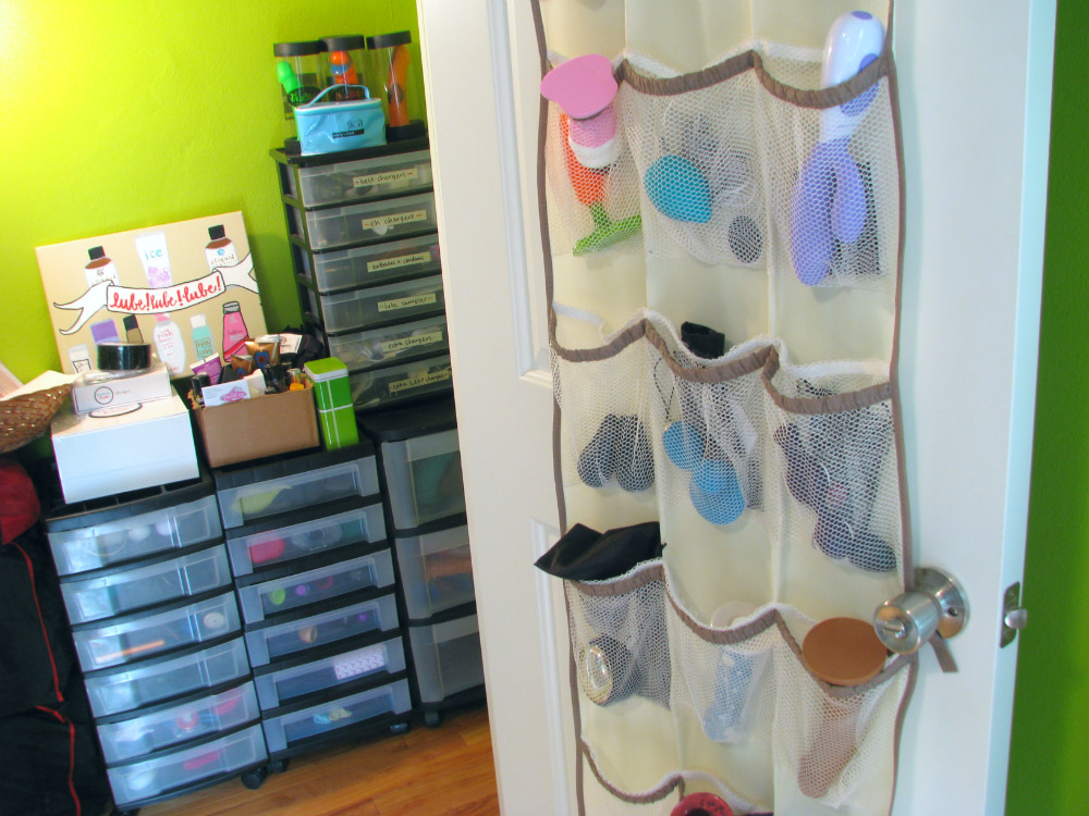 My sex toy closet so far, including over-the-door organizer.