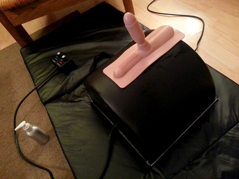 The Sybian on my exercise mat... with lube nearby.