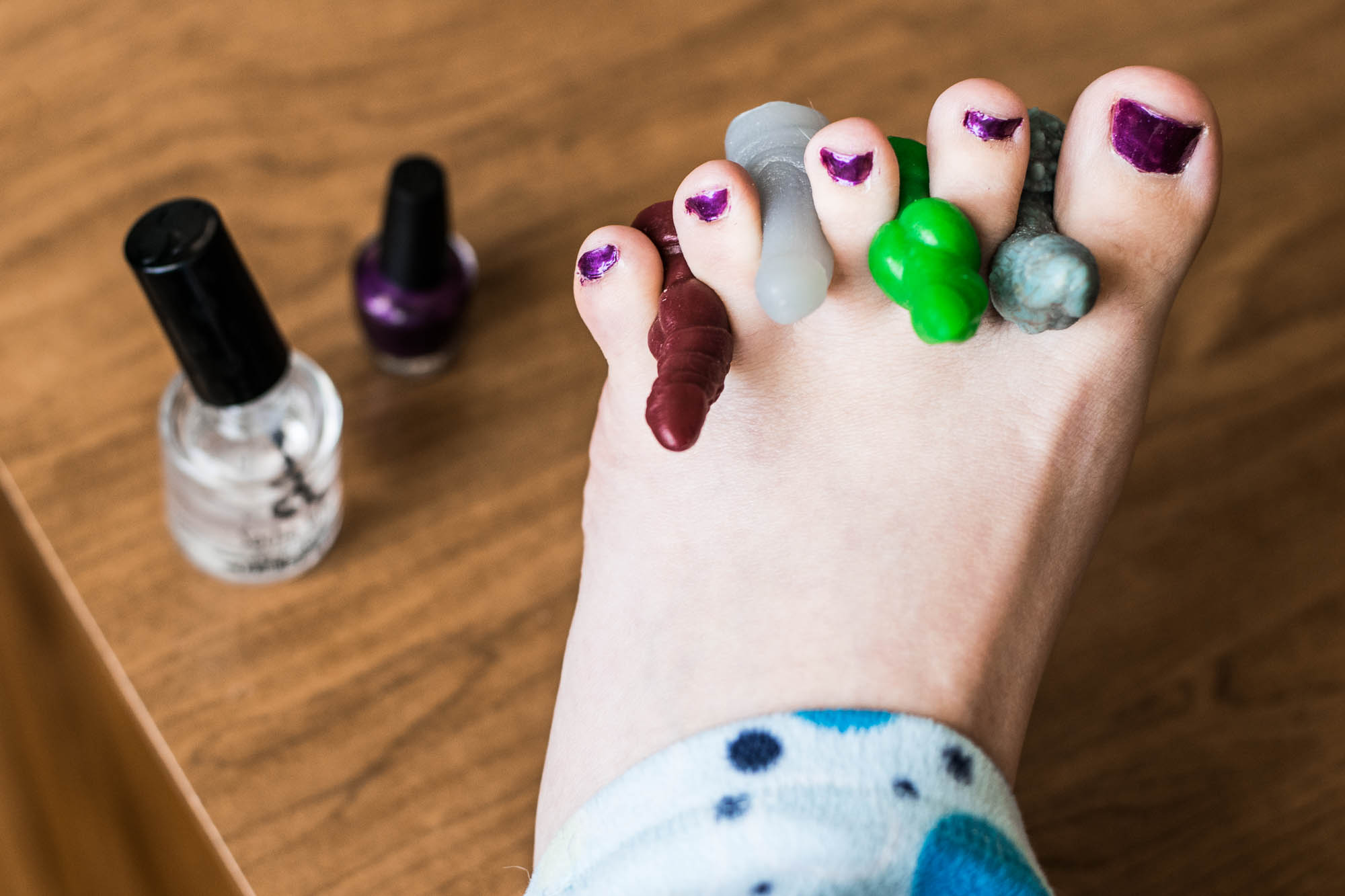 Tiny dildos work well as toe separators during pedicures.