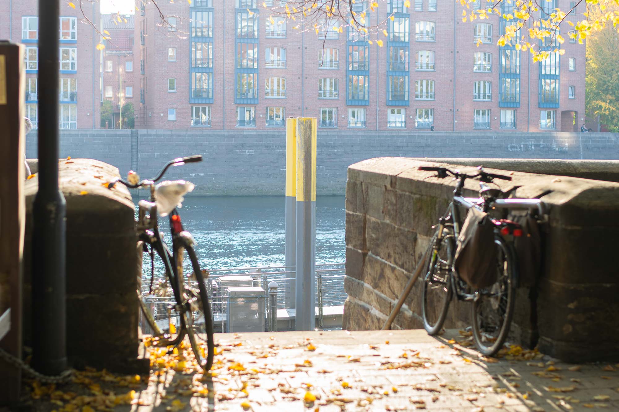 A view of bikes parked at the biergarten by the Weser River in Bremen, Germany.