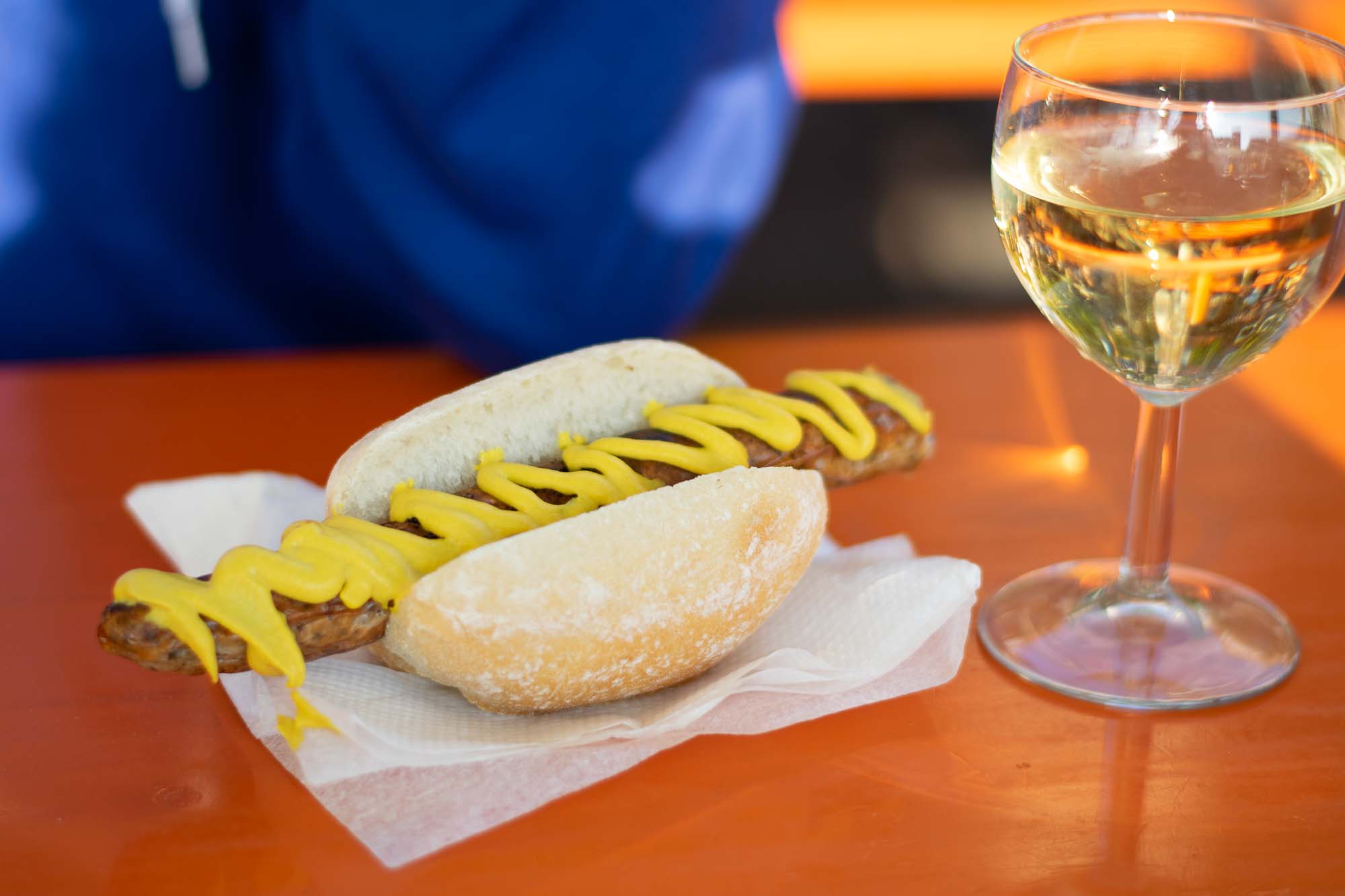 Bratwurst and wine at the biergarten in Bremen, Germany.