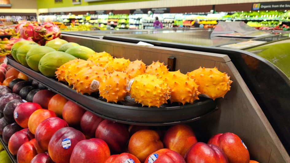 Terrifying-looking bright orange fruits in the grocery store. They have spikes.