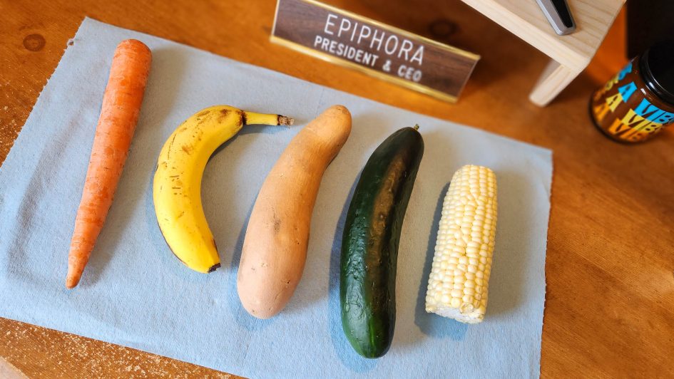 Produce all laid out on my desk prior to masturbation: carrot, banana, yam, cucumber, corn.